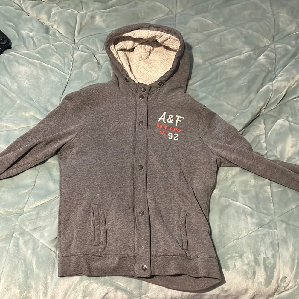 Abercrombie Zip up. Size Large. Warn a couple times. Missing hoodie strings.